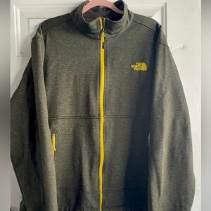 The North Face Charcoal Jacket with Bright Yellow Zipper